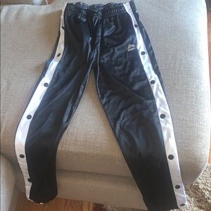 Reebok pants button all the way up the sides